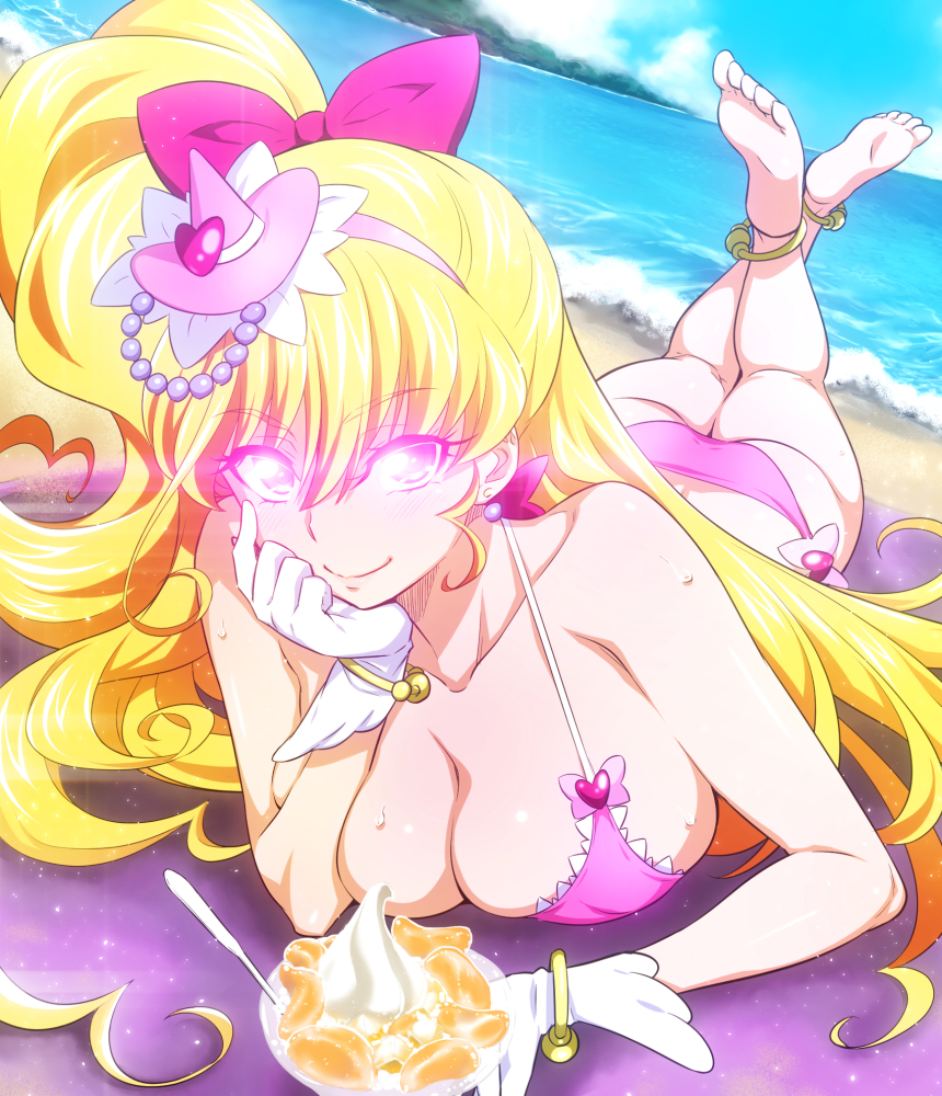 Cure Miracle lies on her stomach on a starry pink beach towel laid over the sand, with the gentle tide behind her.  She wears a pink bikini accented with pink hearts and ribbons.  She has golden bracelets and anklets on--the latter of which are visible because her legs are playfully raised behind her.  A small witch hat rests atop her head.  A larger pink ribbon ties a portion of her voluminous golden blonde hair into a side ponytail.  She smiles smugly at the viewer, resting her cheek in a gloved hand while her other sits next to a bowl of ice cream topped with frozen mikan slices.